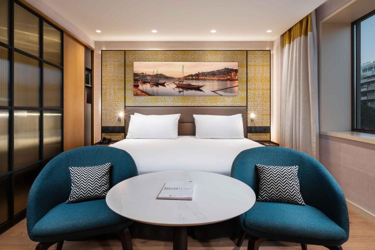 ホテル Eurostars Aliados ポルト エクステリア 写真 A room at the hotel