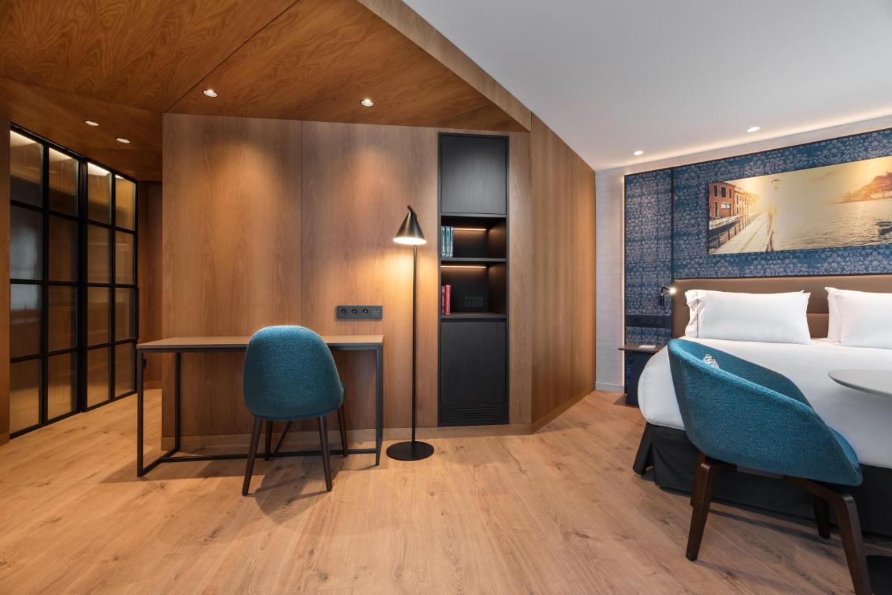 ホテル Eurostars Aliados ポルト エクステリア 写真 A room at the hotel