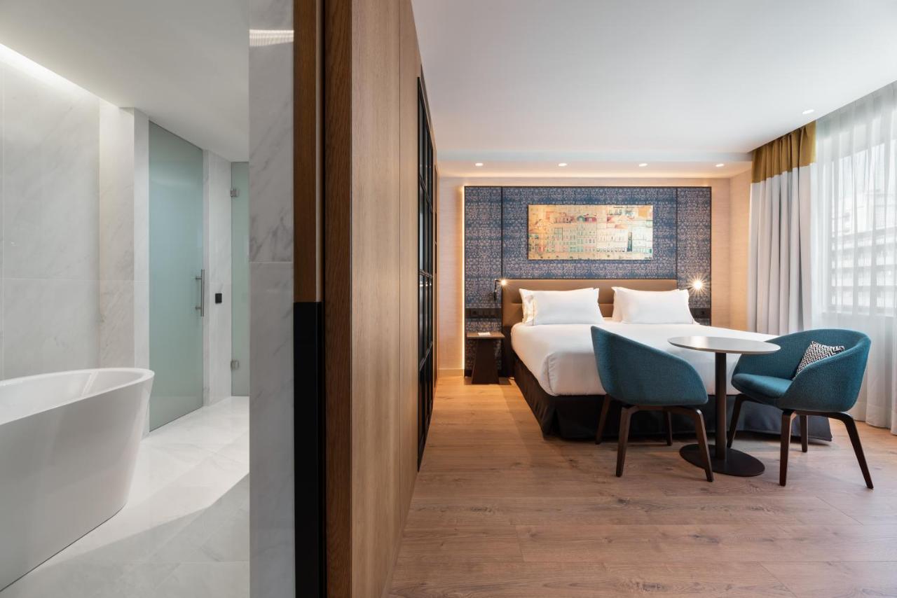 ホテル Eurostars Aliados ポルト エクステリア 写真 A room at the hotel