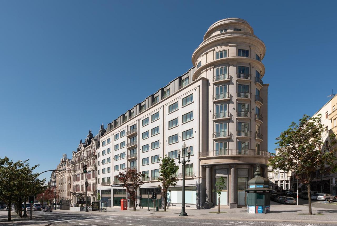 ホテル Eurostars Aliados ポルト エクステリア 写真 The former department store, now apartments