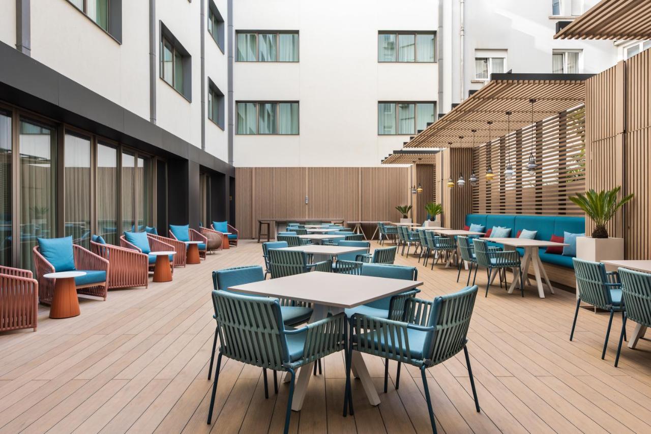 ホテル Eurostars Aliados ポルト エクステリア 写真 The hotel's courtyard