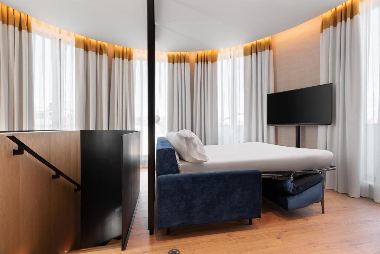 ホテル Eurostars Aliados ポルト エクステリア 写真 A sofa bed