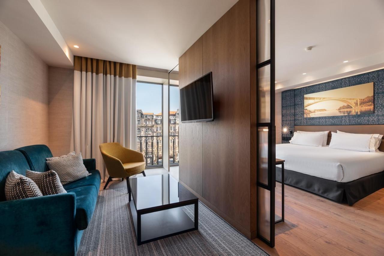 ホテル Eurostars Aliados ポルト エクステリア 写真 A room at the hotel