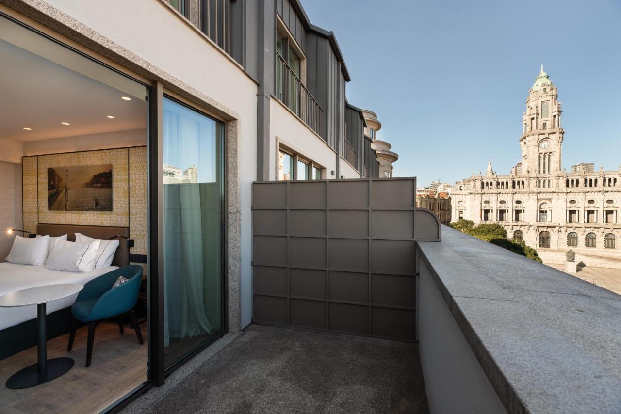 ホテル Eurostars Aliados ポルト エクステリア 写真 The hotel's balcony