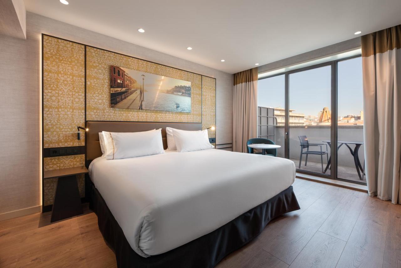 ホテル Eurostars Aliados ポルト エクステリア 写真 Deluxe room