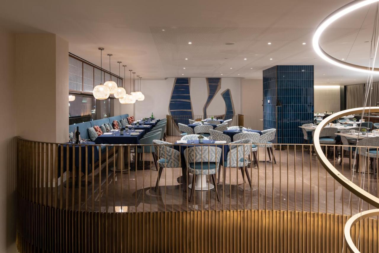 ホテル Eurostars Aliados ポルト エクステリア 写真 The interior of the restaurant