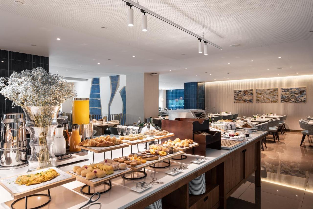 ホテル Eurostars Aliados ポルト エクステリア 写真 The lounge at the airport